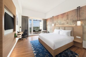 Minibar, coffres-forts dans les chambres, bureau