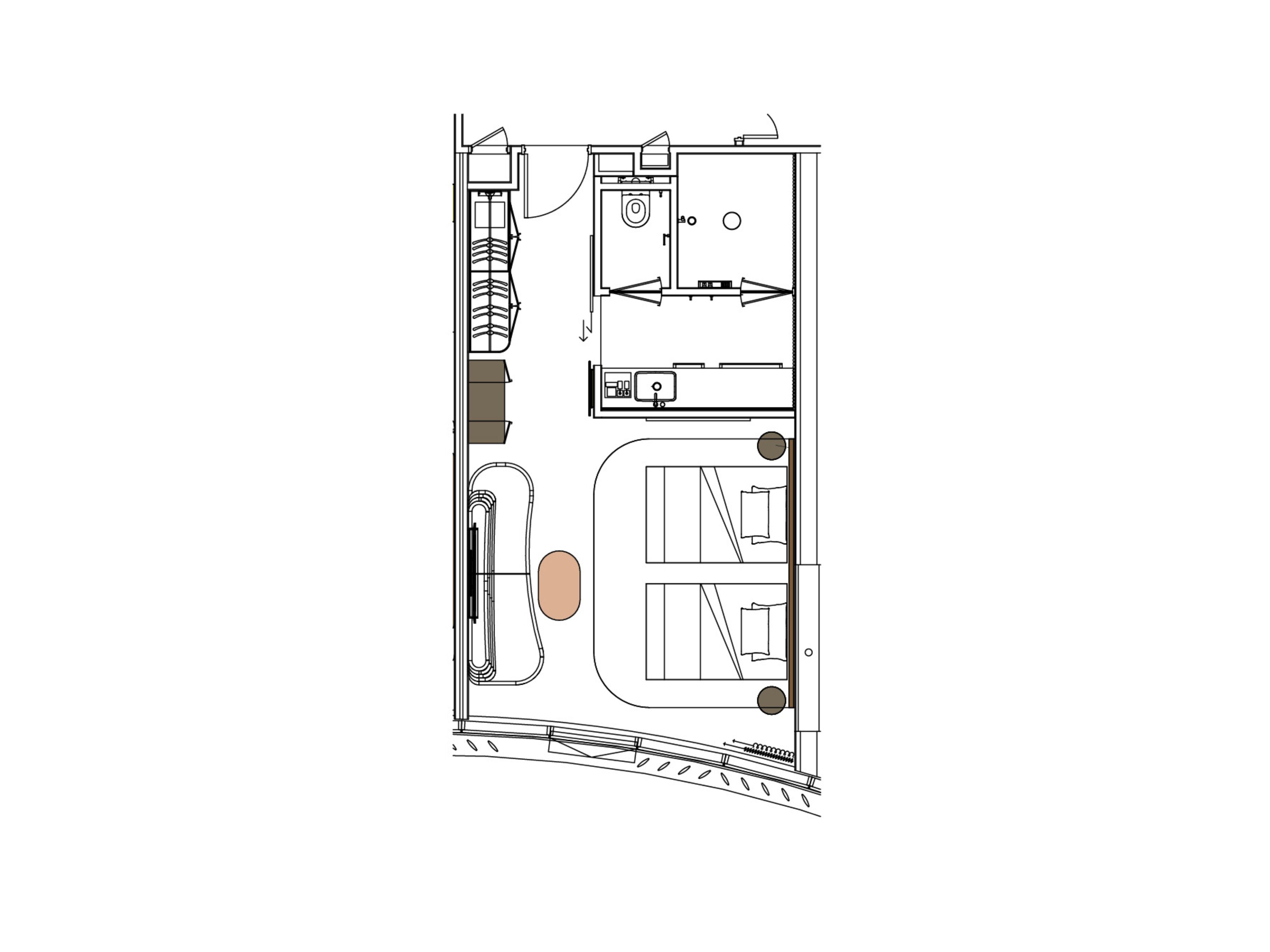 Een plattegrond van een hotelkamer met een badkamer, kitchenette en zithoek.