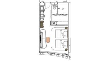 A floor plan of a hotel room with a bathroom, kitchenette, and a seating area.