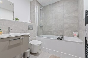 Hair dryer, towels, soap, shampoo