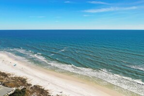 A beach with clear blue water and a sandy shore. - Free Shuttle to Beach, 3 Bedrooms Plus Loft, 30A Grayton Beach, Pool, Bikes (Santa Rosa Beach)