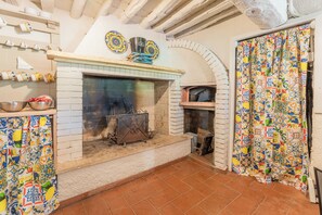 Apartamento, patio, vistas al jardín | Cocina privada | Frigorífico, placa de cocina, lavavajillas y máquina de café espresso