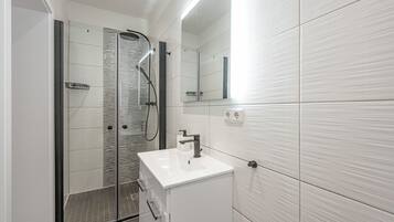 Hair dryer, towels, soap, shampoo