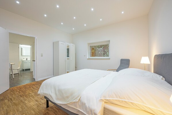 1 bedroom, desk, iron/ironing board, travel cot