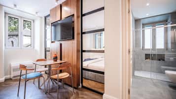 Design Apartment, 1 Bedroom | In-room safe, soundproofing, iron/ironing board, free WiFi