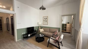 Comfort Apartment, Multiple Bedrooms, Non Smoking, City View | Living area | 42-inch Smart TV with satellite channels, computer monitors