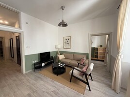 Comfort Apartment, Multiple Bedrooms, Non Smoking, City View | Living area | 42-inch Smart TV with satellite channels, computer monitors