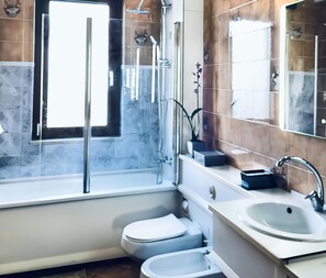 Hair dryer, bidet, towels, soap