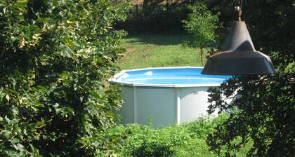 Cozy country house surrounded by greenery