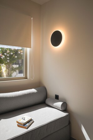 Deluxe Suite, Balcony, Garden View | 1 bedroom, in-room safe, blackout drapes, iron/ironing board