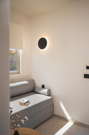 Deluxe Suite, Balcony, Garden View | 1 bedroom, in-room safe, blackout curtains, iron/ironing board