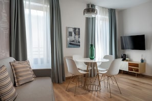Classic Apartment, Canal View (B14) | Living area | TV - Palazzo Dei Guardiani (Venice)