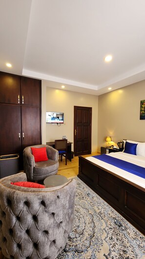 Luxury-Doppelzimmer, Gartenblick | Wohnbereich