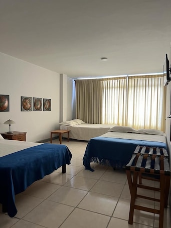 Family Triple Room, Mountain View | Premium bedding, down comforters, free WiFi