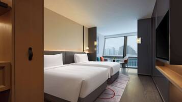 Premium bedding, minibar, in-room safe, blackout drapes