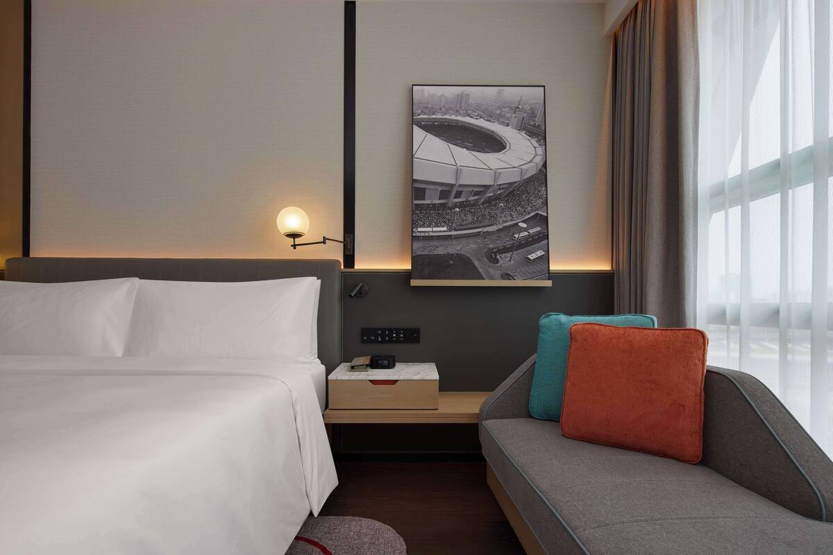 Habitación superior | Ropa de cama de alta calidad, minibar, caja fuerte y cortinas opacas