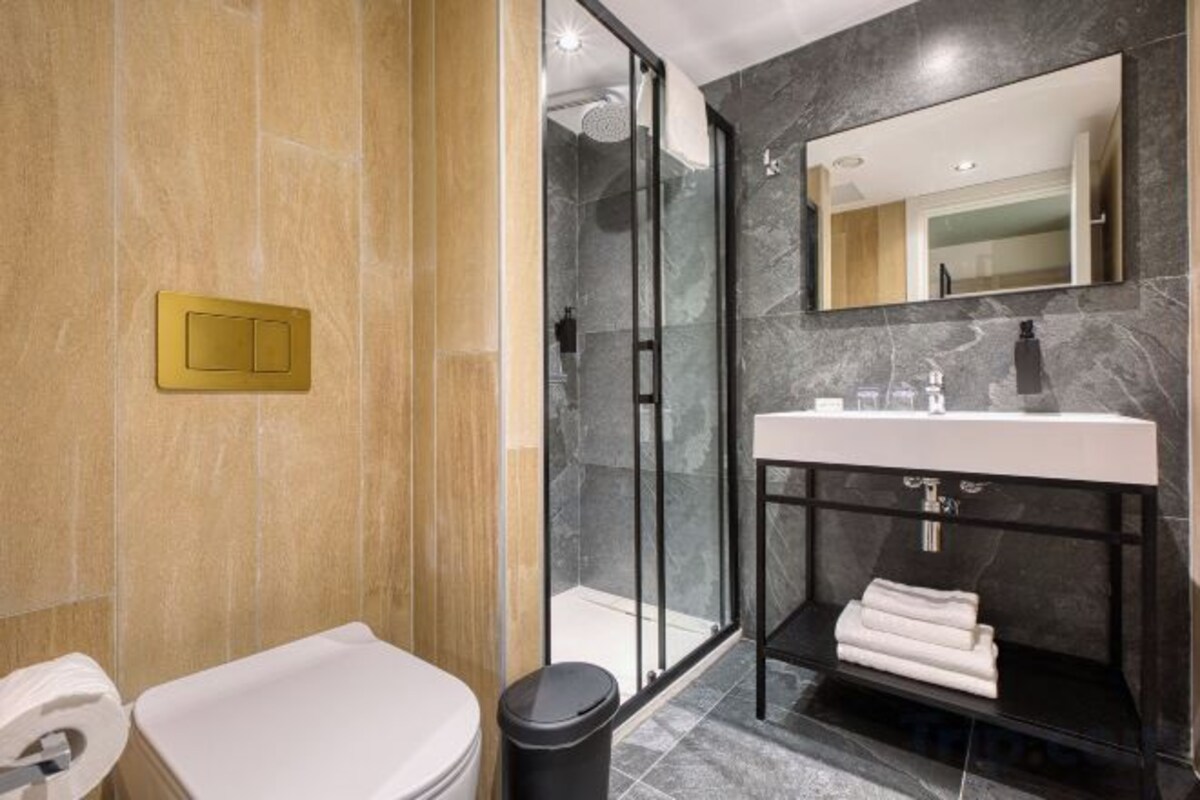 Bathroom | Shower, hair dryer, towels, soap