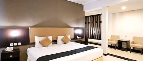 Suíte executiva | 1 quarto, quartos à prova de som, Wi-Fi de cortesia, roupa de cama