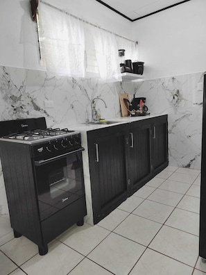 Fridge, microwave, oven, stovetop