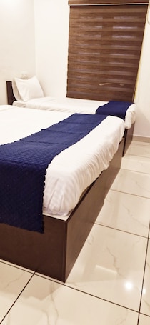 Deluxe Triple Room | Desk, free WiFi