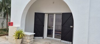 Furnished studio with small sheltered terrace... close to public transport.