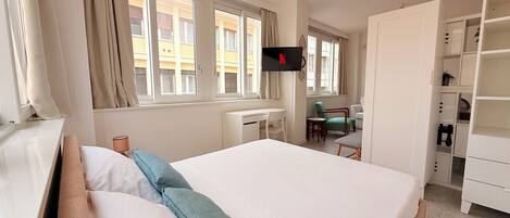 1 غرفة نوم ومكواة/لوح كي وواي فاي وملاءات أسرّة