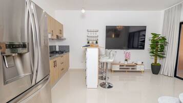 Coffee/tea maker, fridge, microwave, oven
