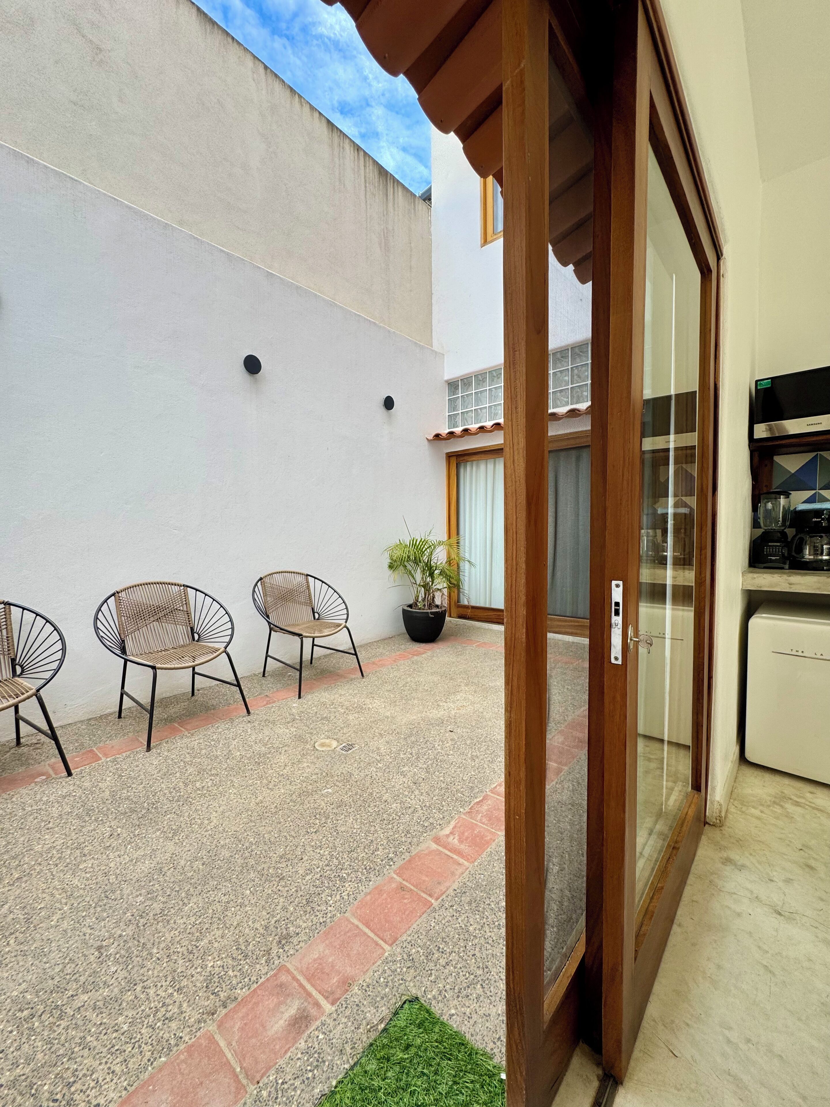 Suite Deluxe, patio, vista al patio | Terraza o patio