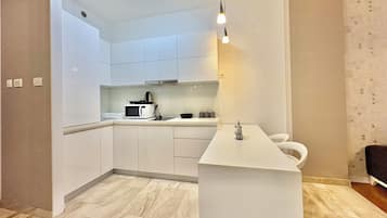 Appartement Deluxe, balcon, vue ville | Cuisine privée