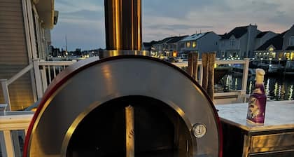 Waterfront 5-bedroom house w/ Boat Lift & Jet Ski Docks. Short walk to beach.