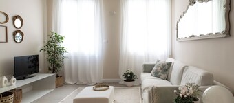 In the center brand new elegant apartment with parking in the private garden