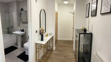 Hair dryer, towels, soap, shampoo