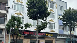 A hotel building with a sign reading "Thulee Luxury Hotel". - Thulee Luxury Hotel - Phu My (Ho Chi Minh City)