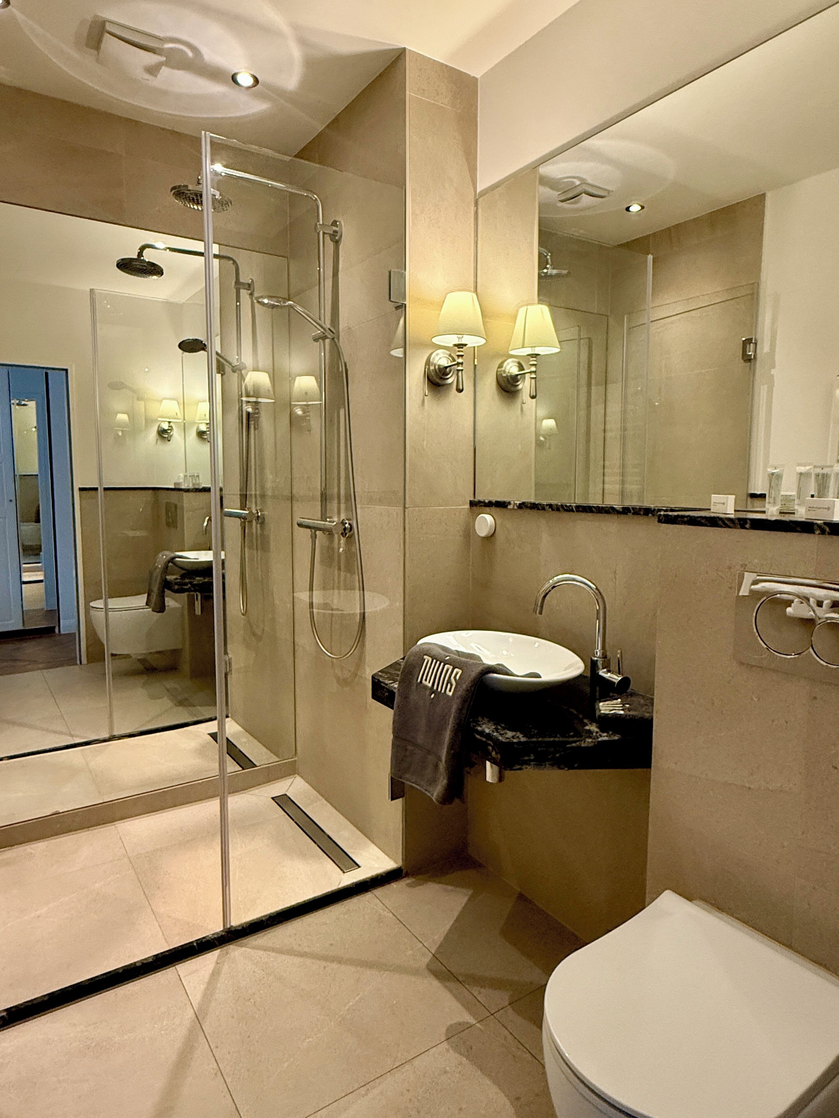 Hair dryer, towels, soap, shampoo