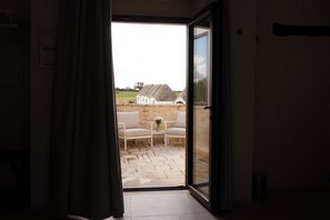 Suite junior, vistas al jardín | Terraza o patio