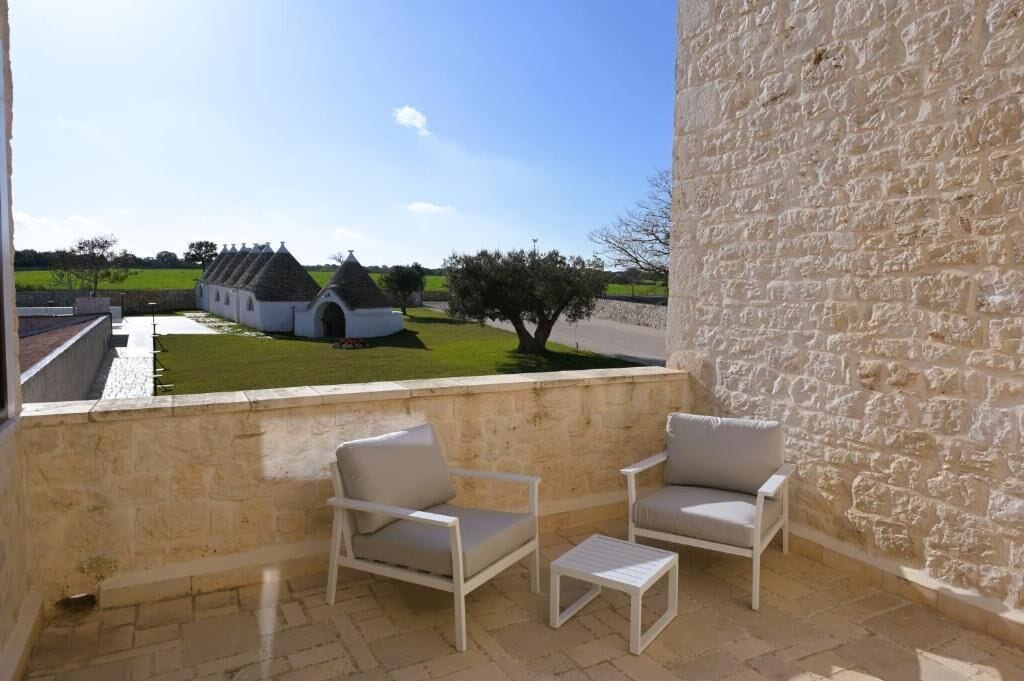 Suíte júnior, vista para o jardim | Terraço/pátio