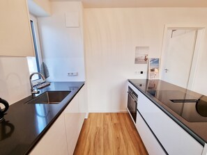 Frigorífic, forn, placa de cuina i rentaplats