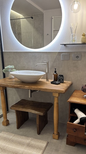 Hair dryer, towels, soap, shampoo