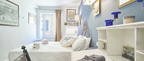 2 slaapkamers, een strijkplank/strijkijzer, gratis wifi, beddengoed