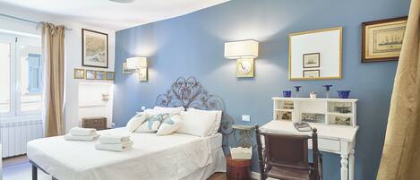 2 slaapkamers, een strijkplank/strijkijzer, gratis wifi, beddengoed