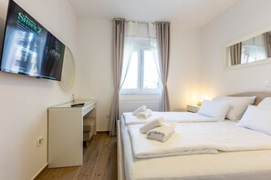 3 chambres, fer et planche à repasser, accès Internet, draps fournis