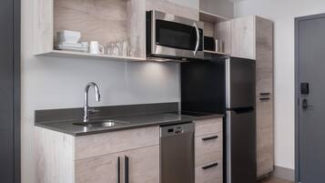 Standard Room, 1 King Bed, Non Smoking, Kitchenette (Shower Only) | Desk, laptop workspace, blackout drapes, iron/ironing board