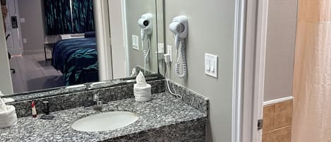 Basic Single Room, 1 Bedroom, Smoking, Bathtub | Bathroom | Bathtub, hair dryer, towels, soap