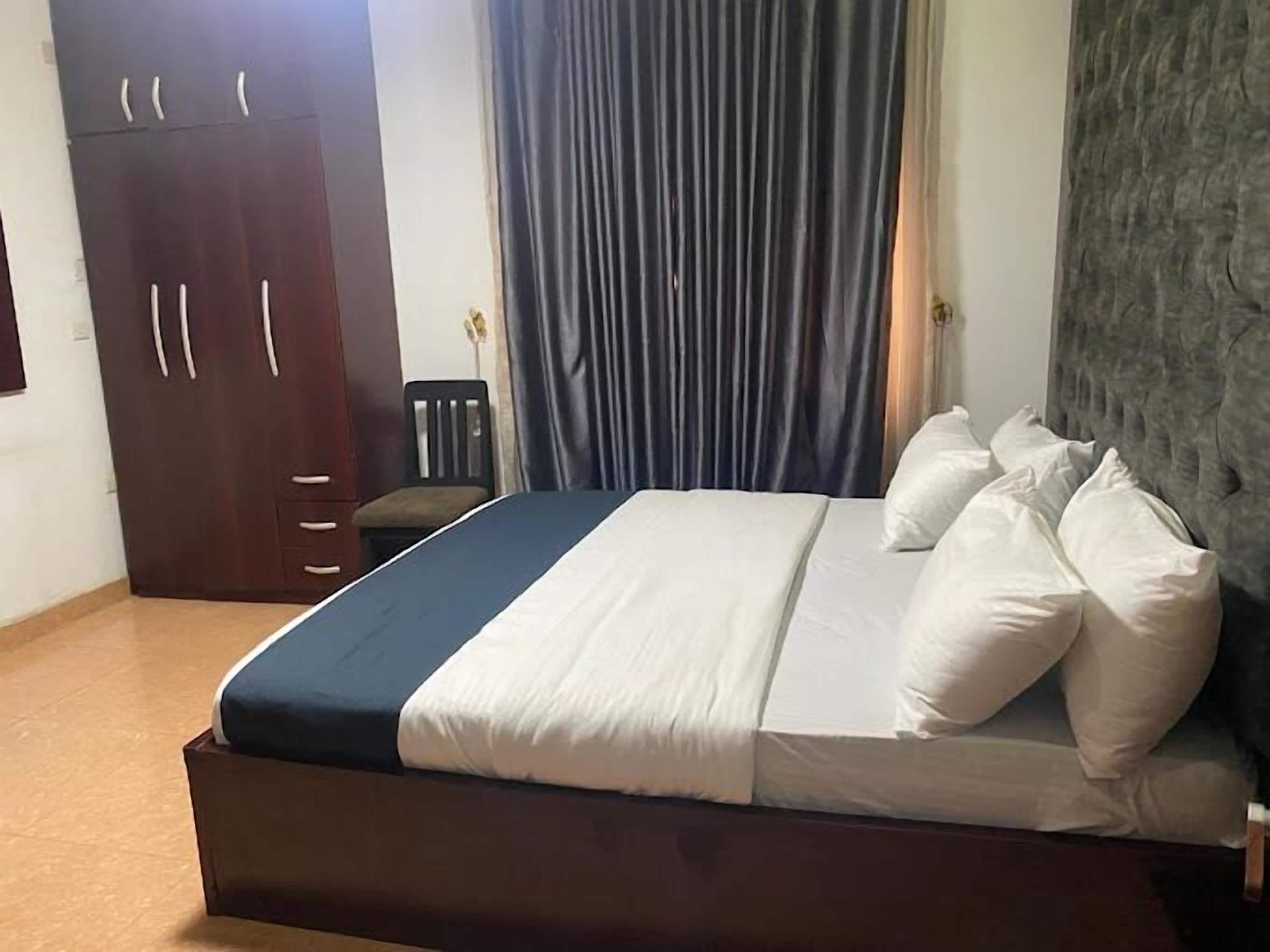 Deluxe Room, Balcony, City View | Desk, laptop workspace, blackout drapes, soundproofing