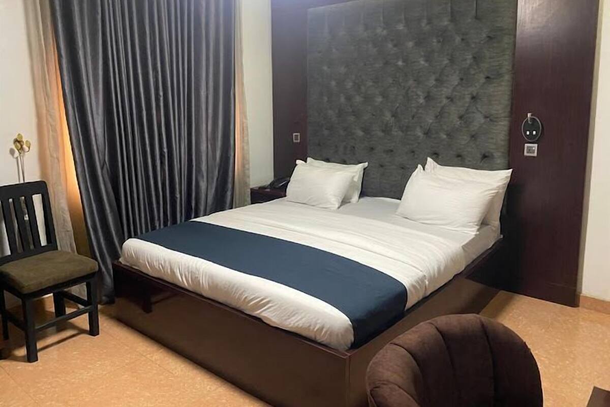 Deluxe Room, Balcony, City View | Desk, laptop workspace, blackout curtains, soundproofing