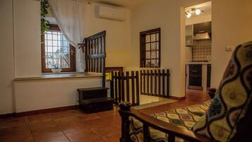 Maison, balcon | Coin séjour