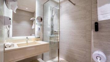 Separate bathtub and shower, hair dryer, bathrobes, slippers