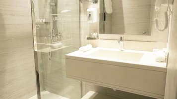 Separate bathtub and shower, hair dryer, bathrobes, slippers