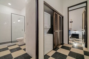 Hair dryer, towels, shampoo, toilet paper