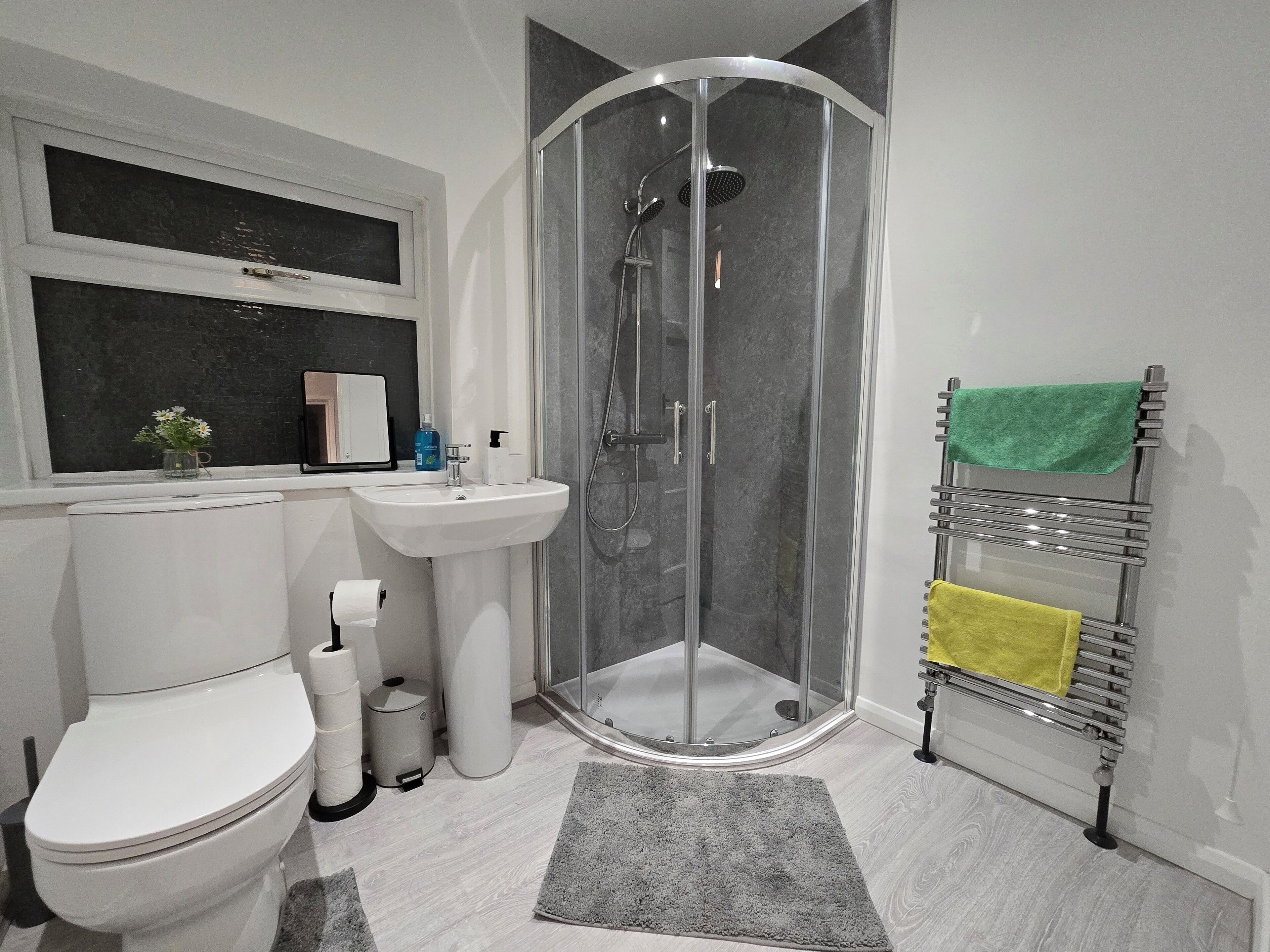 Shower, hair dryer, towels, soap